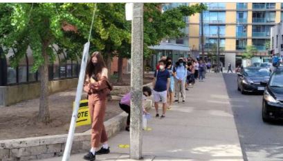 Long lines Outside certain polling places in Toronto