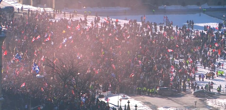 Thousands of people assemble on Parliament Hill for a big anti-vaccine rally