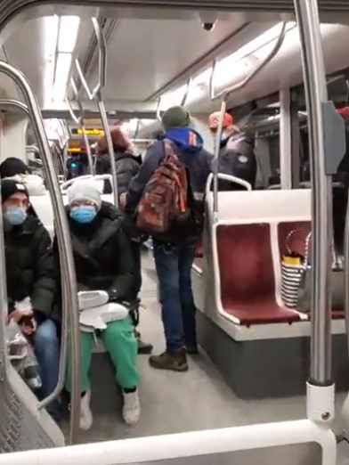 A female rider spits at an Asian passenger on a Toronto train