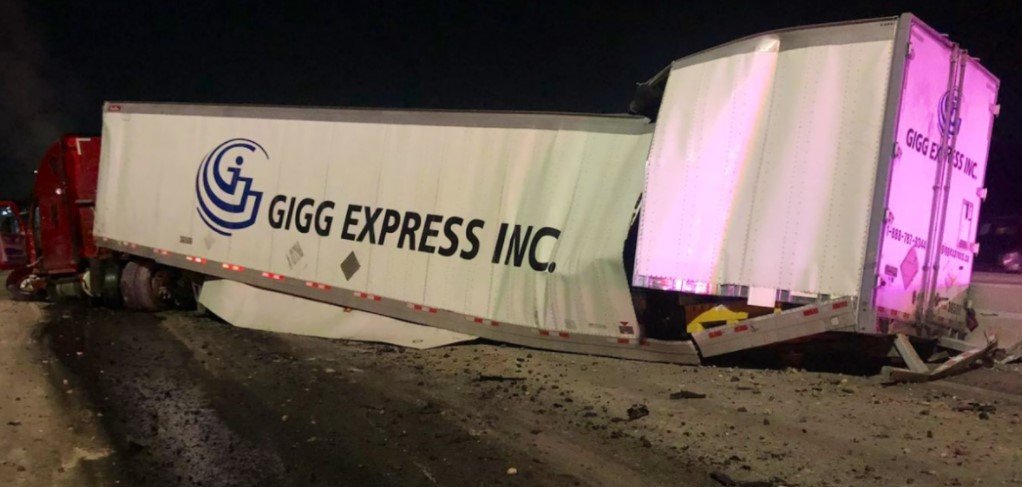 After a cargo truck crashes through a construction zone on Highway 401, driver faces charges