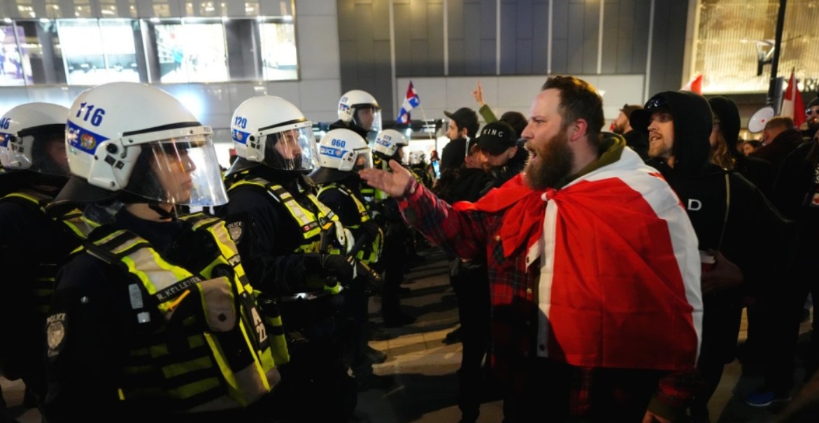 Ahead of scheduled protests in Ottawa, police make arrests and restrict downtown roadways