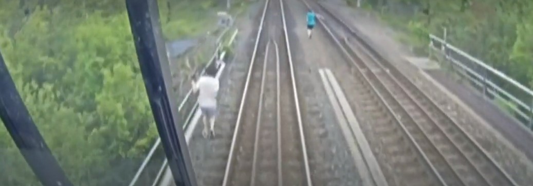 A video released by Metrolinx shows a GO train nearly hitting three people in Etobicoke