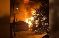 Firefighters in North York battle a three-alarm fire