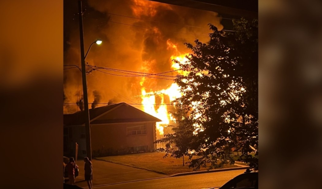 Firefighters in North York battle a three-alarm fire